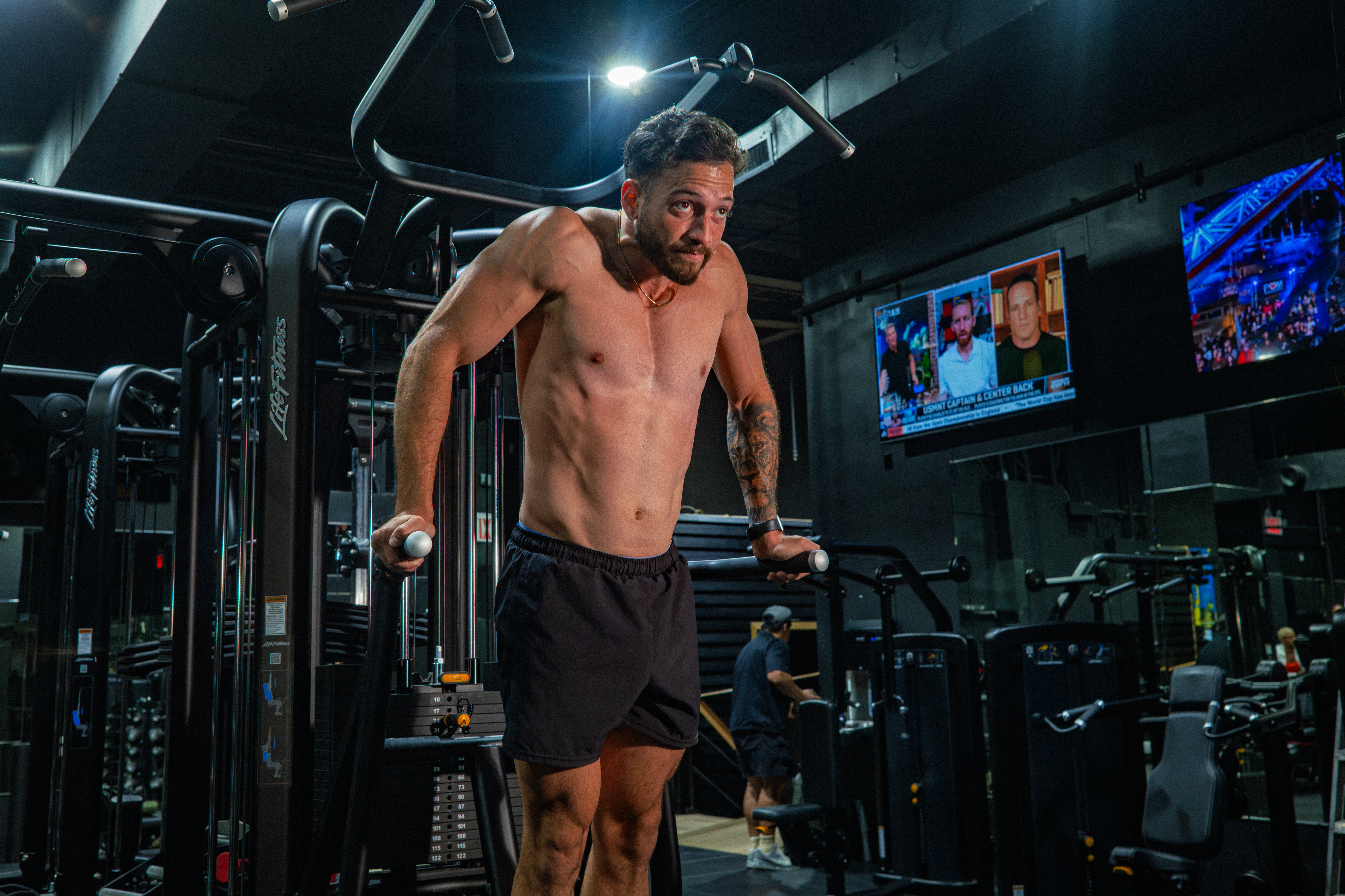 Athlete performing dips on strength equipment at GYM NYC Lexington